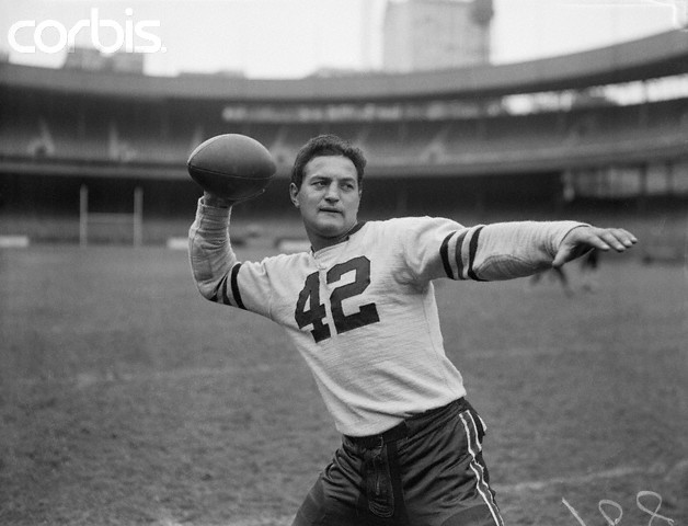 Sid Luckman in Passing Position with Football