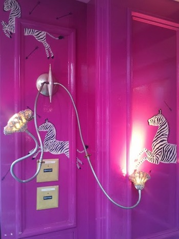 Wall panels in Upstairs on the Square's hotpink zebra room. Photo: 
