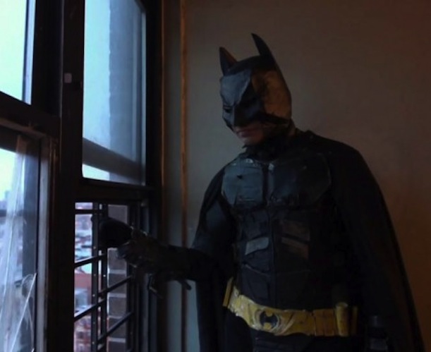 One of the brothers acting out a scene from Christopher Nolan's "Dark Knight" in the documentary "The Wolfpack."