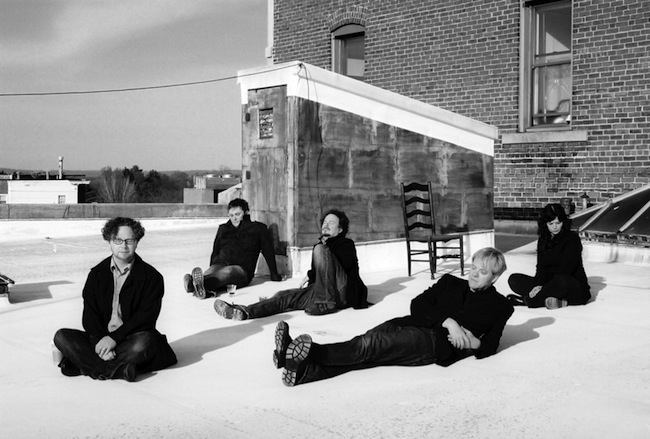 The Winterpills relaxing in the snow. The group performs at [] this week.