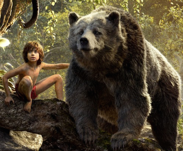 Mowgli and Baloo in Disney's new and improved "The Jungle Book."