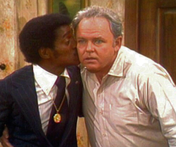 Sammy Davis, Jr. as himself and Carroll O'Connor as Archie Bunker in a memorable scene from "All in the Family."  Photo: popoptiq.com.