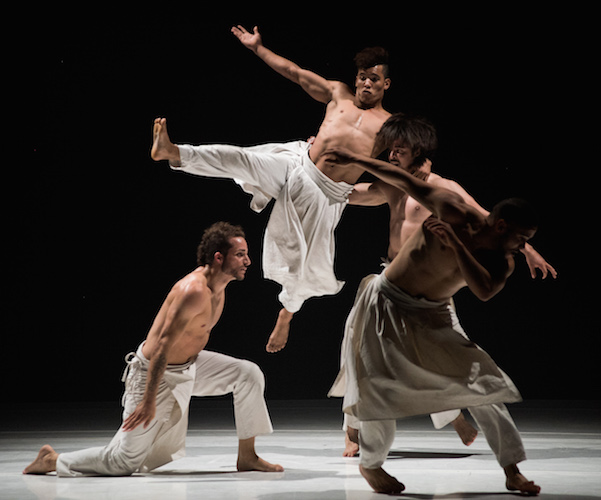 Giovanni MARTINAT, Mourad MESSAOUD, Amine MAAMAR KOUADRI, and Nassim HENDI of Compagnie Hervé KOUBI in What the Day Owes to the Night (Ce que le jour doit à la nuit). Photo Cherylynn Tsushima