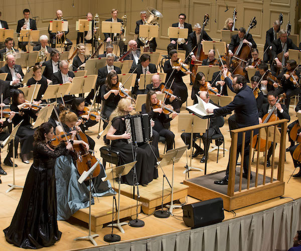 Andris Nelsons leads the BSO and soloists in the world premiere of Gubaidulina's Triple Concerto. Photo:  Winslow Townson