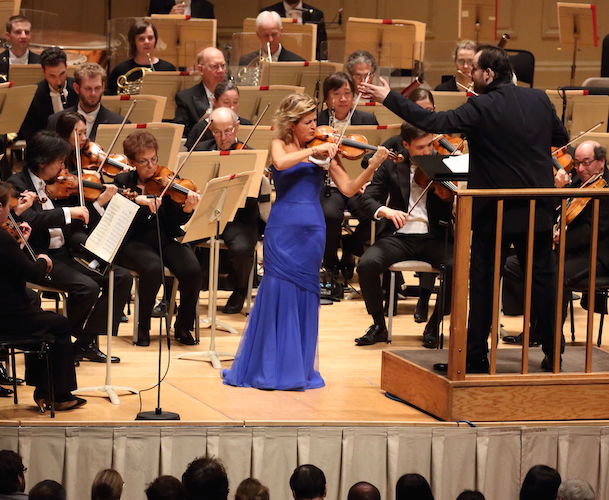 Anne-Sophie Mutter performing with Andris Nelson and the Boston Symphony Orchestra. PhotoL Hilery Scott.