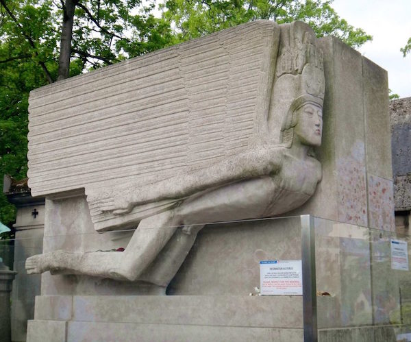 Oscar Wilde is located in Père Lachaise Cemetery, Paris, France. It took nine to ten months to complete by the sculptor Jacob Epstein, with an accompanying plinth by Charles Holden and an inscription carved by Joseph Cribb.