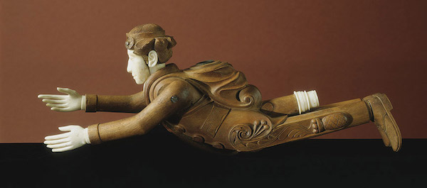 Haida Effigy Pipe. Carved wood and ivory, with hinged arms. Queen Charlotte Islands, British Columbia, Canada. Ca. 1840.